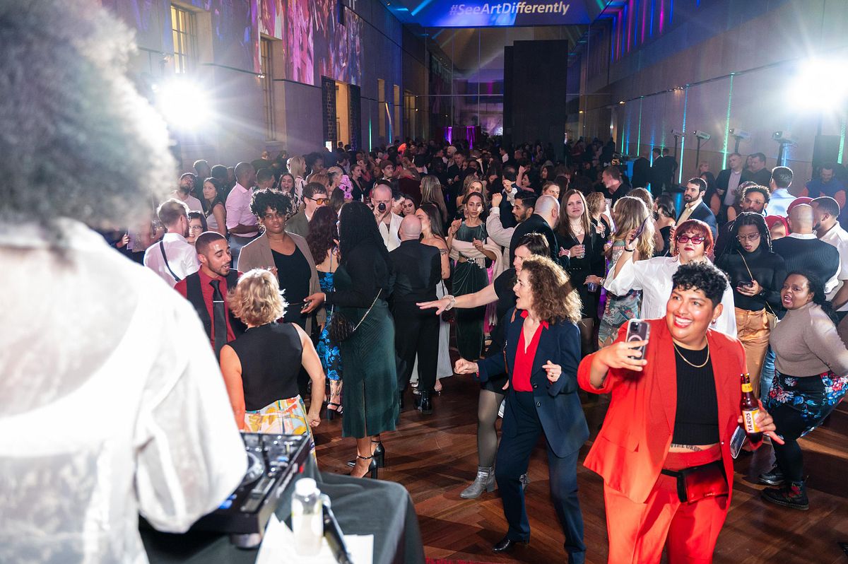 Event photography capturing guests dancing and celebrating during the Barnes Foundation&rsquo;s Art After Dark event in Philadelphia, highlighting connection, artistry, and cultural storytelling.