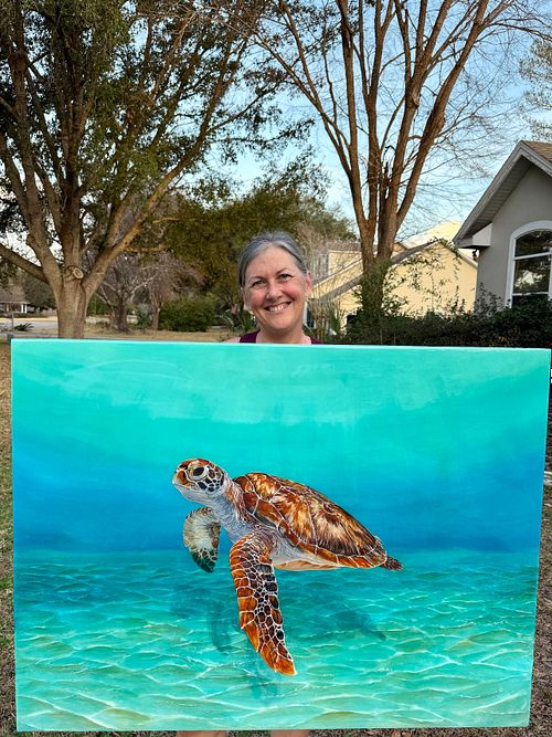 A passionate artist dedicated to capturing the beauty and wonder of the marine world.