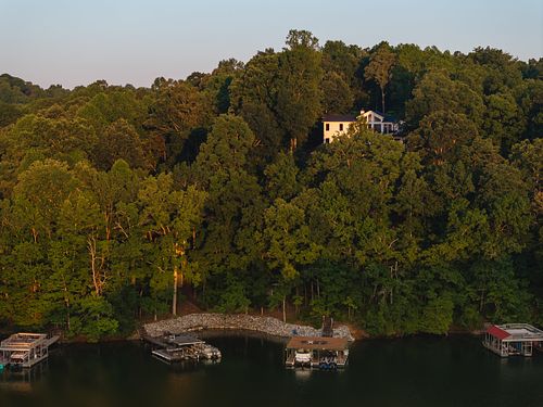 view of back of house and dock