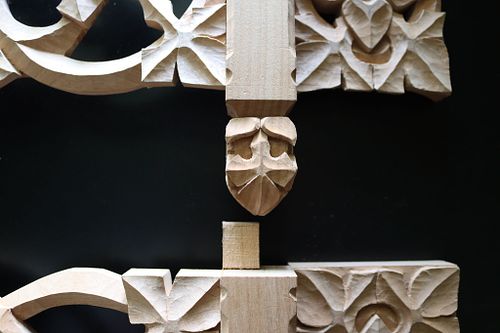 close up of the pendant carvings on the reliquary shelves