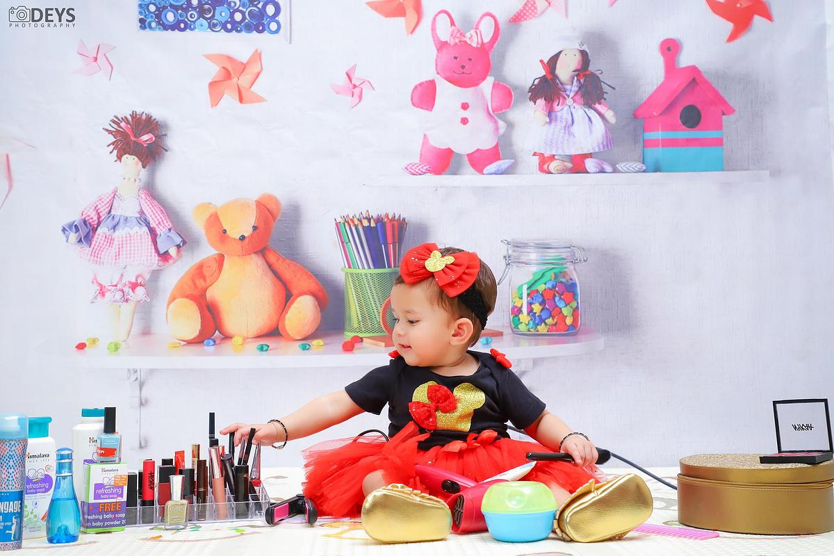 First birthday photographers of baby girl near me