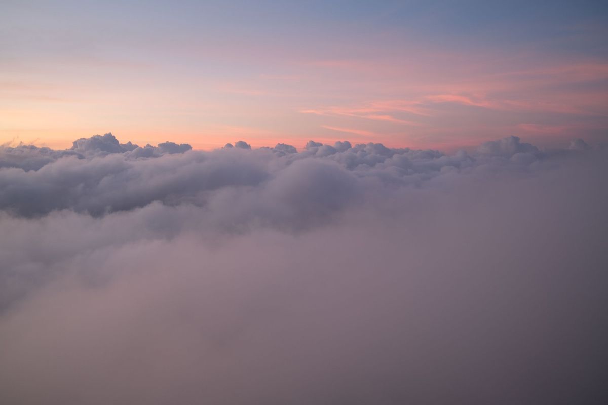 Beautiful sunrise above the clouds on Mt. Batur in Bali, Indonesia
