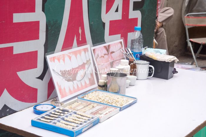 Dental services display on sidewalk in Chengdu China