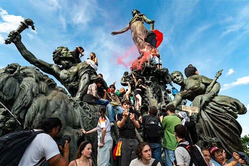 French police clash with May Day protesters as tens of thousands march in Paris, France.