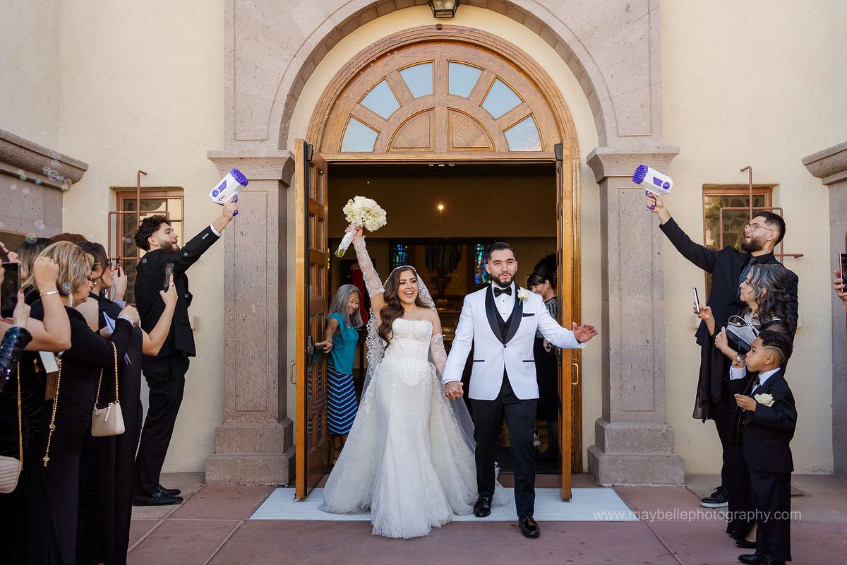 Bubble Exit at Saint Joseph, Husband of Mary Roman Catholic Church in Las Vegas Wedding Photography