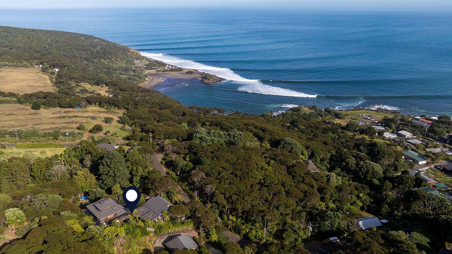 Aerial drone map view of luxury property within walking distance to Indicators surf break in Raglan by Flax Cove Studio.