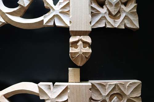 close up of the pendant carvings on the reliquary shelves
