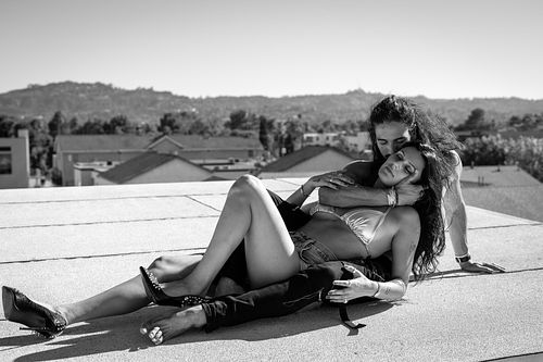 Black and white seated portrait of Julian & Annie in Los Angeles — editorial portrait by David Andrade