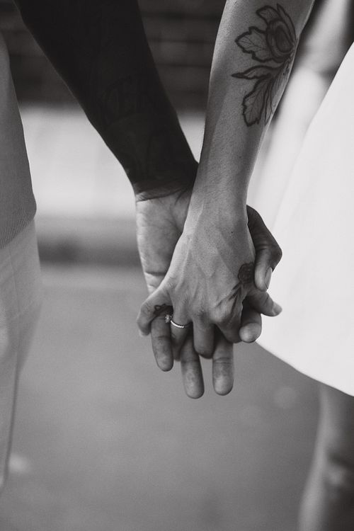 pre wedding close up shot holding hands black and white