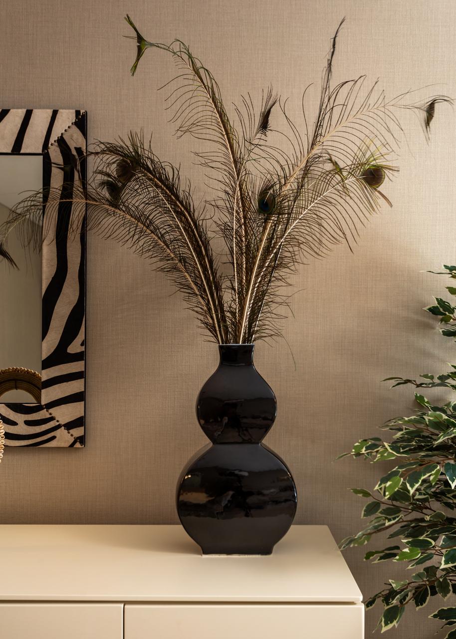 Fotografia de no Apartamento Montijo, destacando a decora&ccedil;&atilde;o com Estilo Africano.