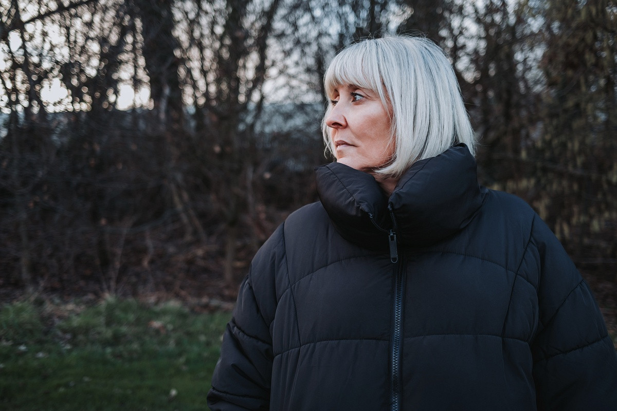 Portrait of woman in country side