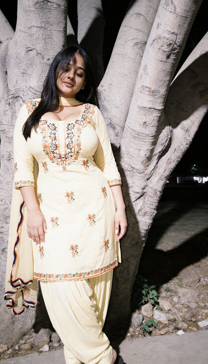 Nupur In yellow suit