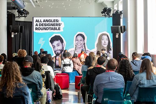 Creative leaders speaking on stage during the All Angles: A Designers’ Roundtable session at B.PHL Fest 2023 in Philadelphia, captured by professional event photographer.