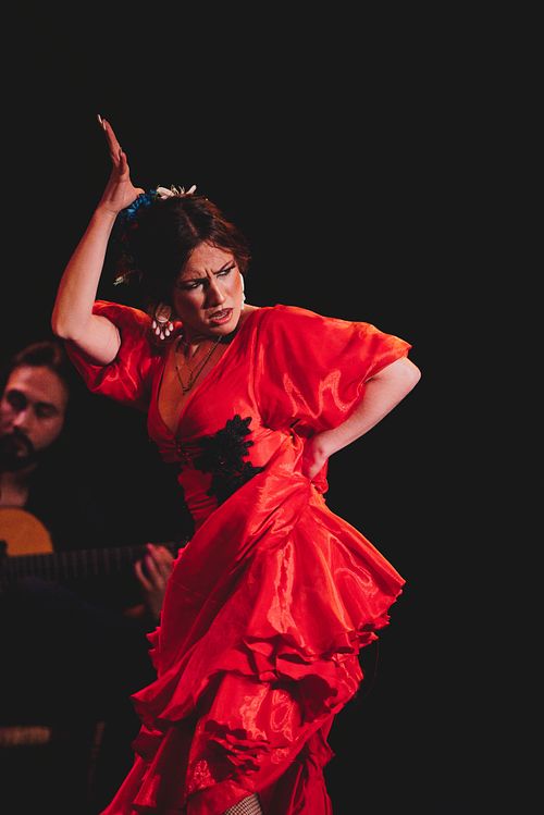 Sofia del Rio dancing expressive flamenco in tablao in Jerez