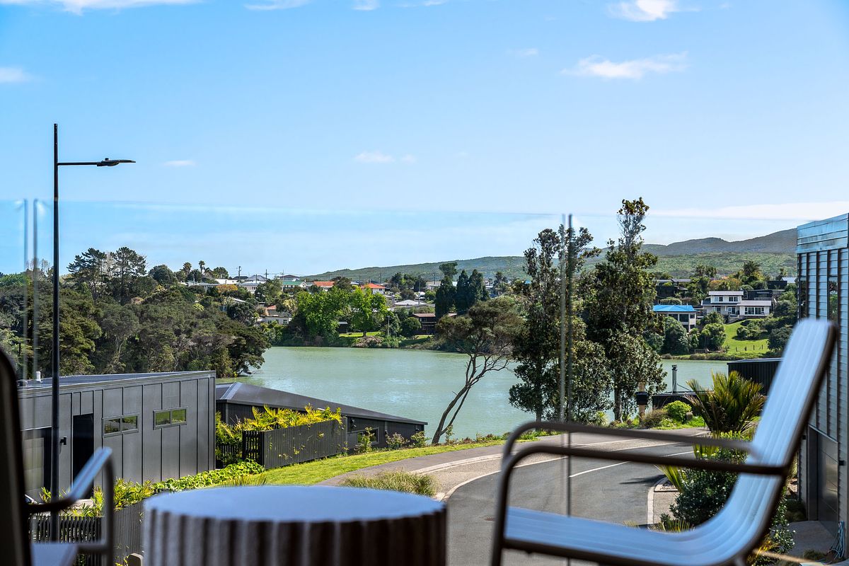 Luxury interior photography of a West Village home overlooking the Raglan estuary by Flax Cove Studio.