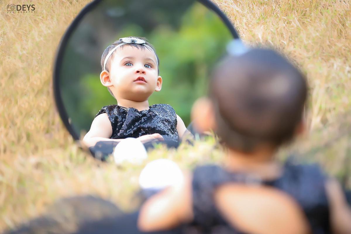 Creative prebirthday shoot with mirror
