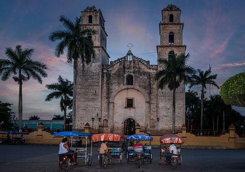 TAXI STAND IN FRONT OF CHURCH