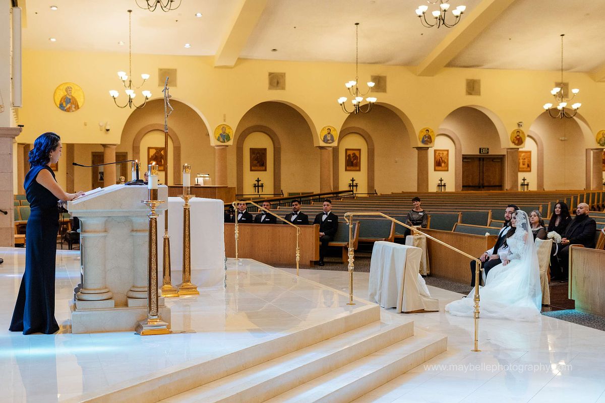 Exchanging vows at Saint Joseph, Husband of Mary Roman Catholic Church in Las Vegas Wedding Photography