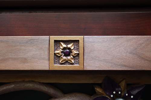 Small carving of Star of Bethlehem flower in the door frame of St. Joseph Shrine for St. Bernadette Catholic Church in Lancaster, Ohio