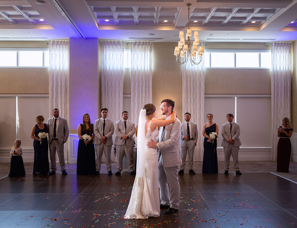 the first dance of the bride and groom in the ballroom hyatt, dewey beach, sussex county, de