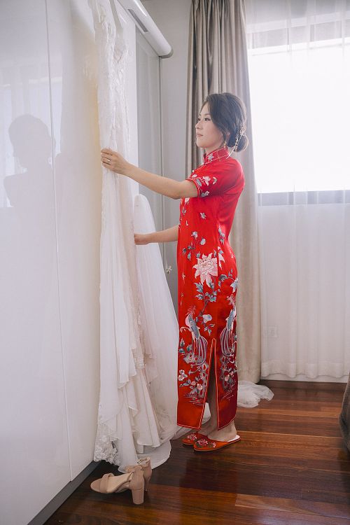 Chinese bride getting ready for traditional tea ceremony