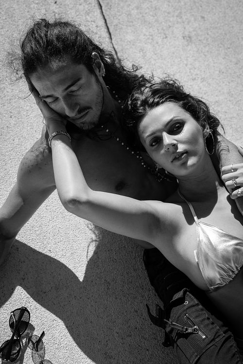 Black and white dramatic lighting portrait of Julian & Annie in Los Angeles — creative portrait by David Andrade
