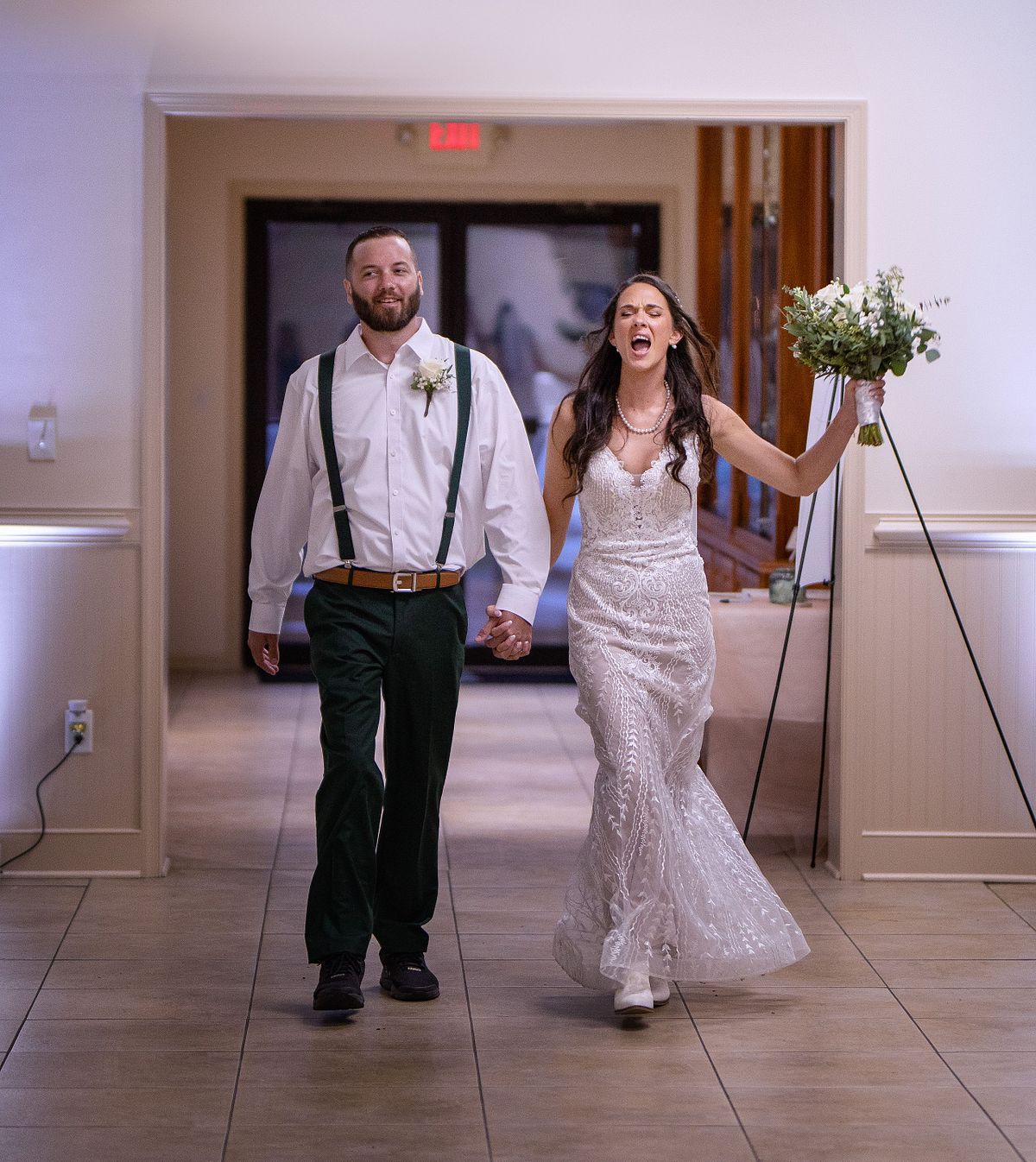bride and groom entering the firehall in Selbyville, DE to be announced as husband and wife