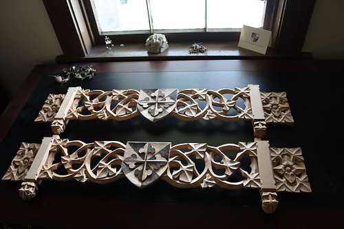the carvings for the reliquary shelves before stain and finish in raking light