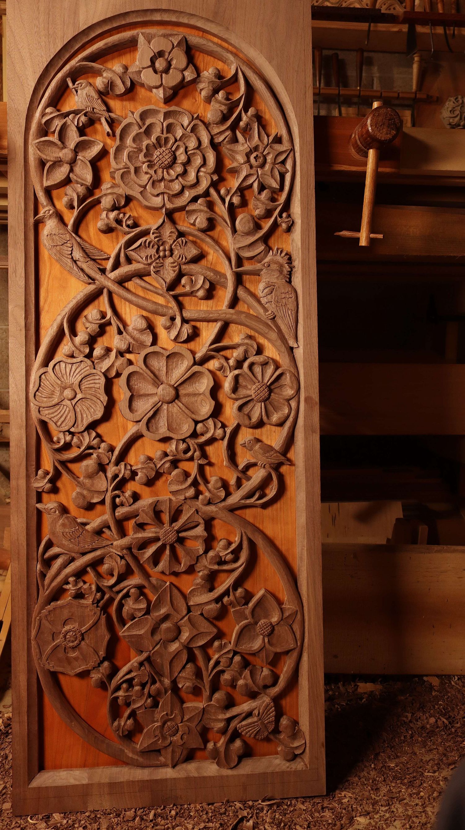 One of the door panels for the Altarpiece carved and ready for finish