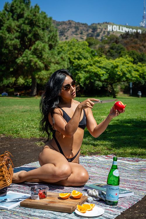 Close‑up outdoor bikini portrait of Pear with Hollywood Sign background — lifestyle photography by David Andrade, Los Angeles
