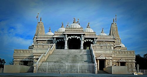 Impressive temple with detailed architecture and grand steps.