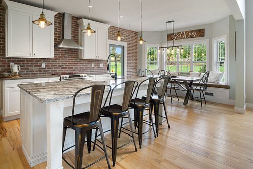 Professional interior real estate photography featuring balanced natural and ambient lighting