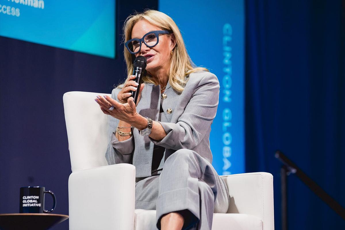 Corporate event photography capturing a thought leader speaking during a purpose-driven &ldquo;Future of Funding&rdquo; panel at the Clinton Global Initiative 2024 Annual Meeting, emphasizing leadership presence, meaningful connection, and mission-centered storytelling.