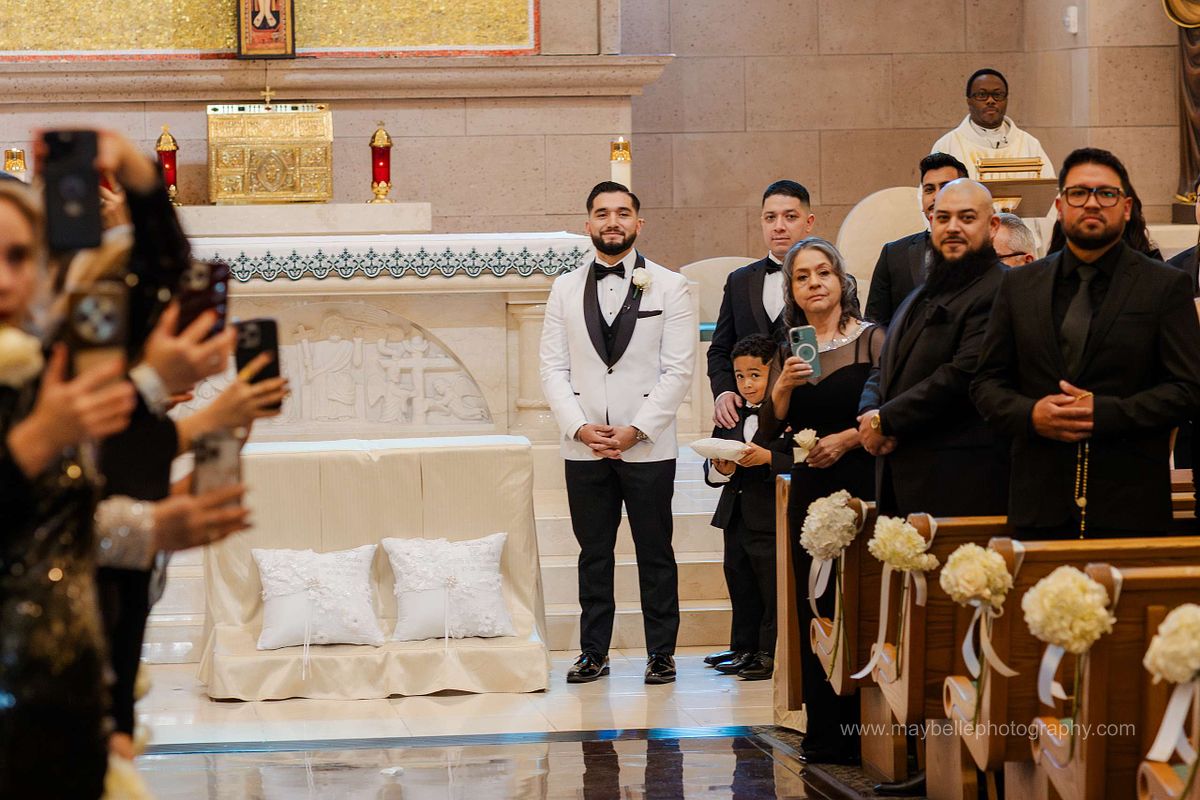 Exchanging vows at Saint Joseph, Husband of Mary Roman Catholic Church in Las Vegas Wedding Photography