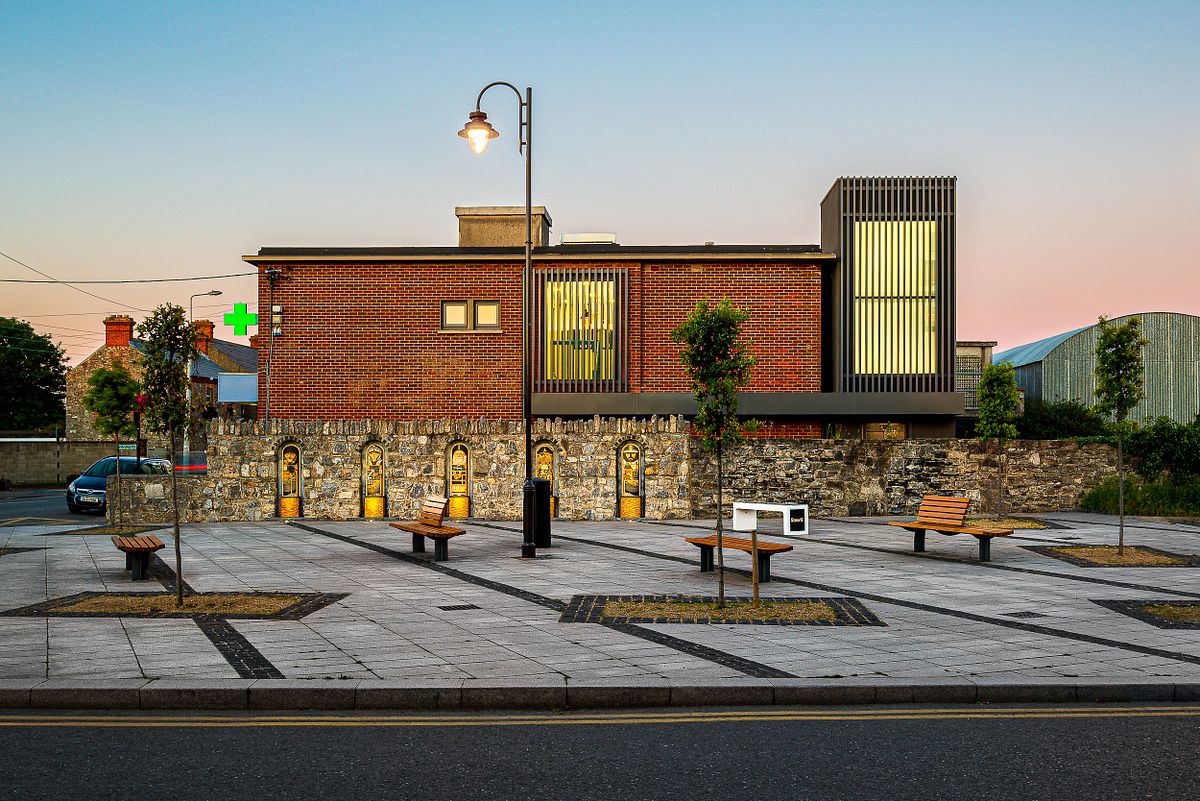 Exterior photograph of Rush Medical Centre in Rush, North Dublin, showcasing the new lift tower addition and its integration with the existing building.