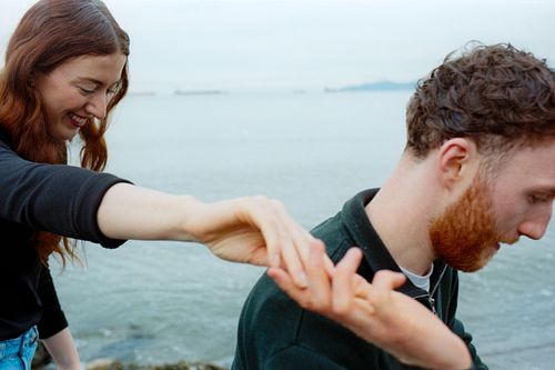 a couple enjoying a special moment shot on 35mm film