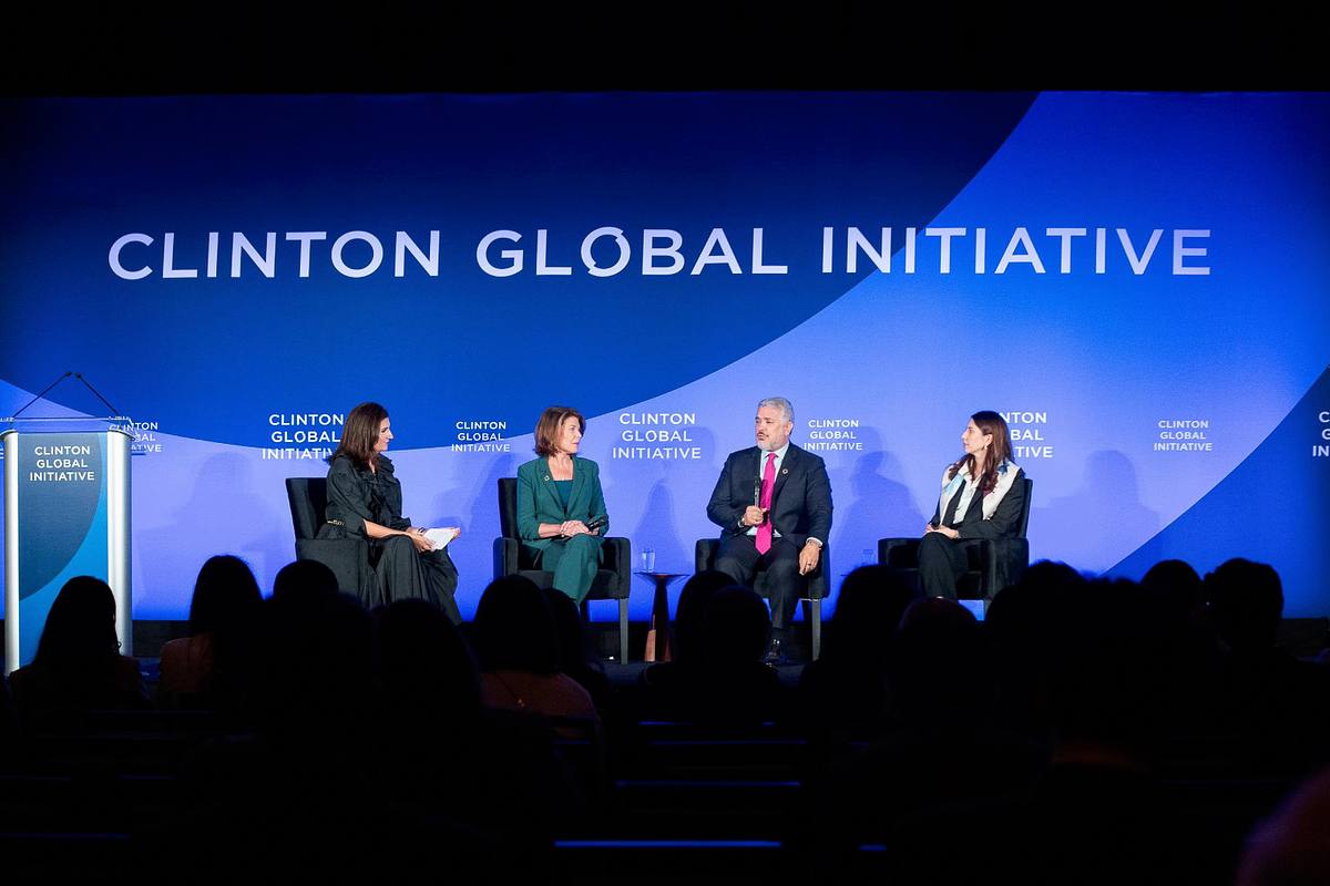 Corporate event photography capturing panelists on stage during the &ldquo;Bridging Digital Divides&rdquo; session at the Clinton Global Initiative 2024 Annual Meeting in New York City, emphasizing leadership dialogue, connection, and equity in technology access.