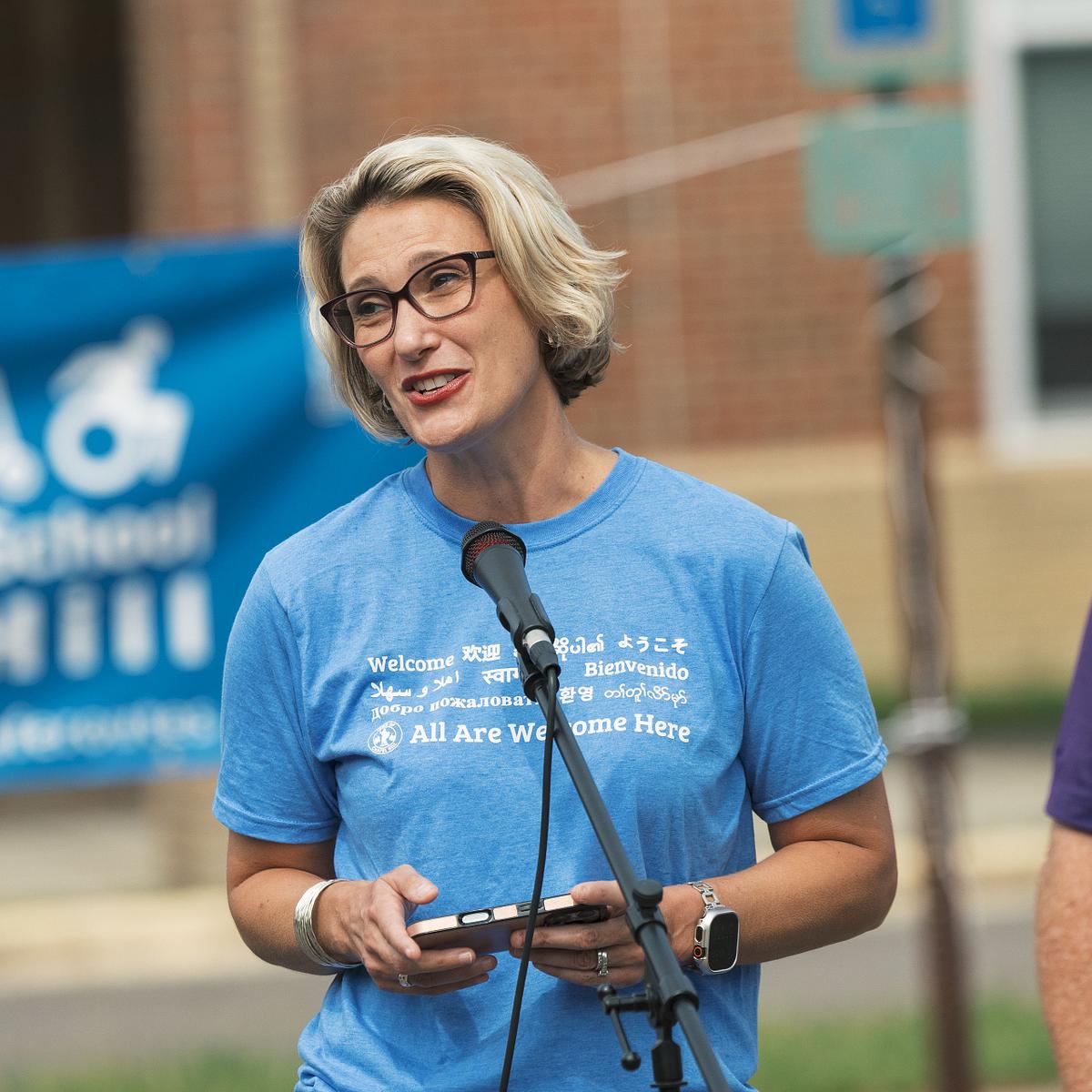 Chapel Hill Mayor Jess Anderson giving a speaking at the 2025 Roll and Stroll event at Scroggs Elementary School in Chapel Hill, NC